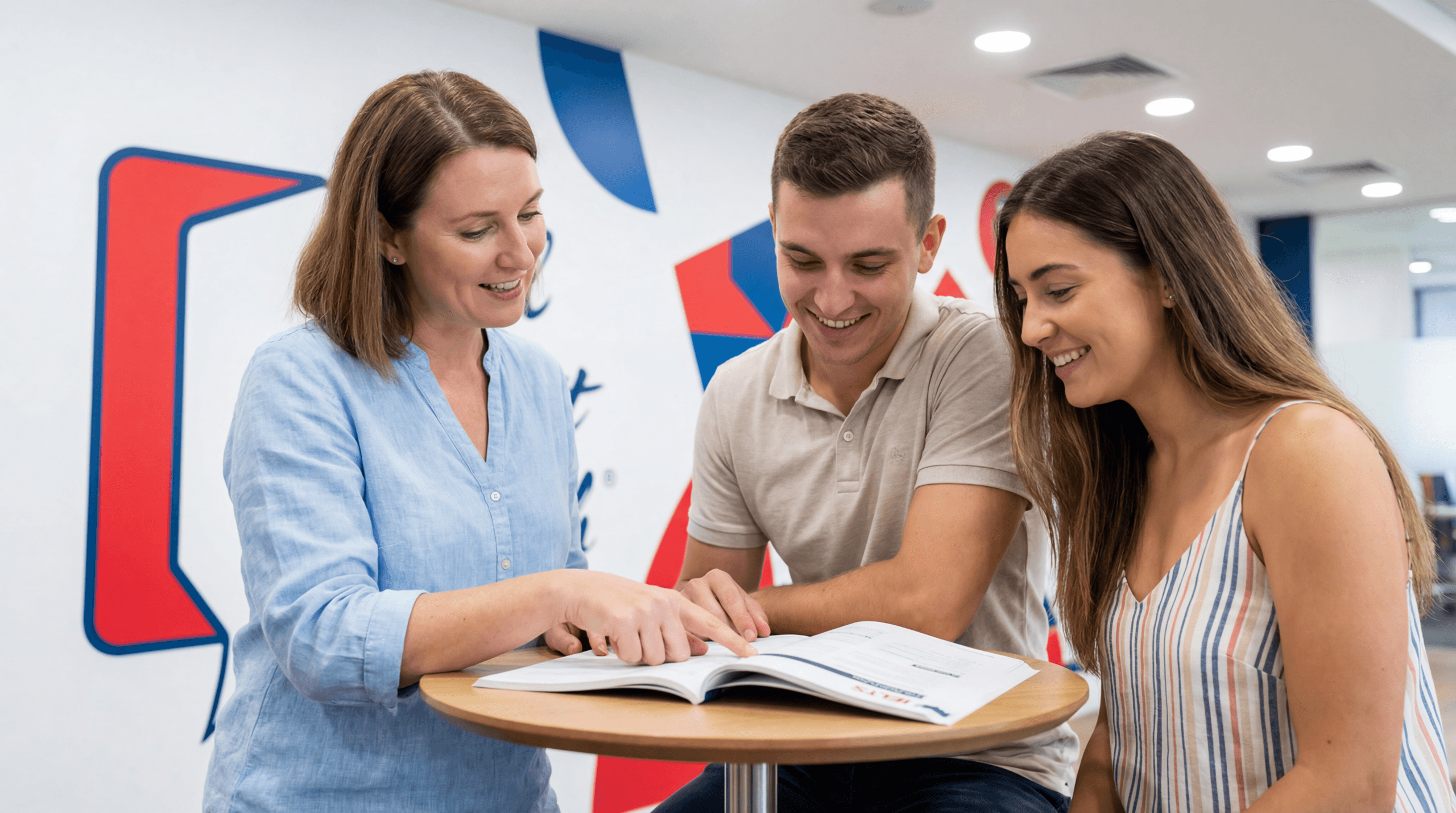 Inside the Wall Street English UAE centre — a modern learning space with the brand logo on the wall